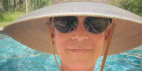 Jamie Lee Curtis Poses in Swimsuit and Sun Hat in IG Pool Selfie